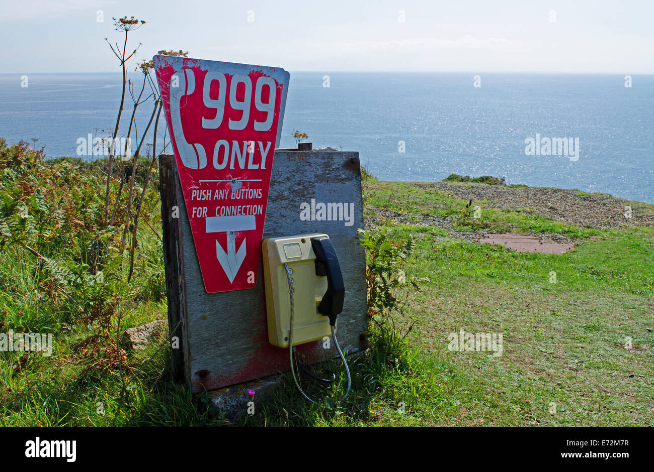 an emergency telephone on the coast at Treen in Cornwall, UK Stock Photo