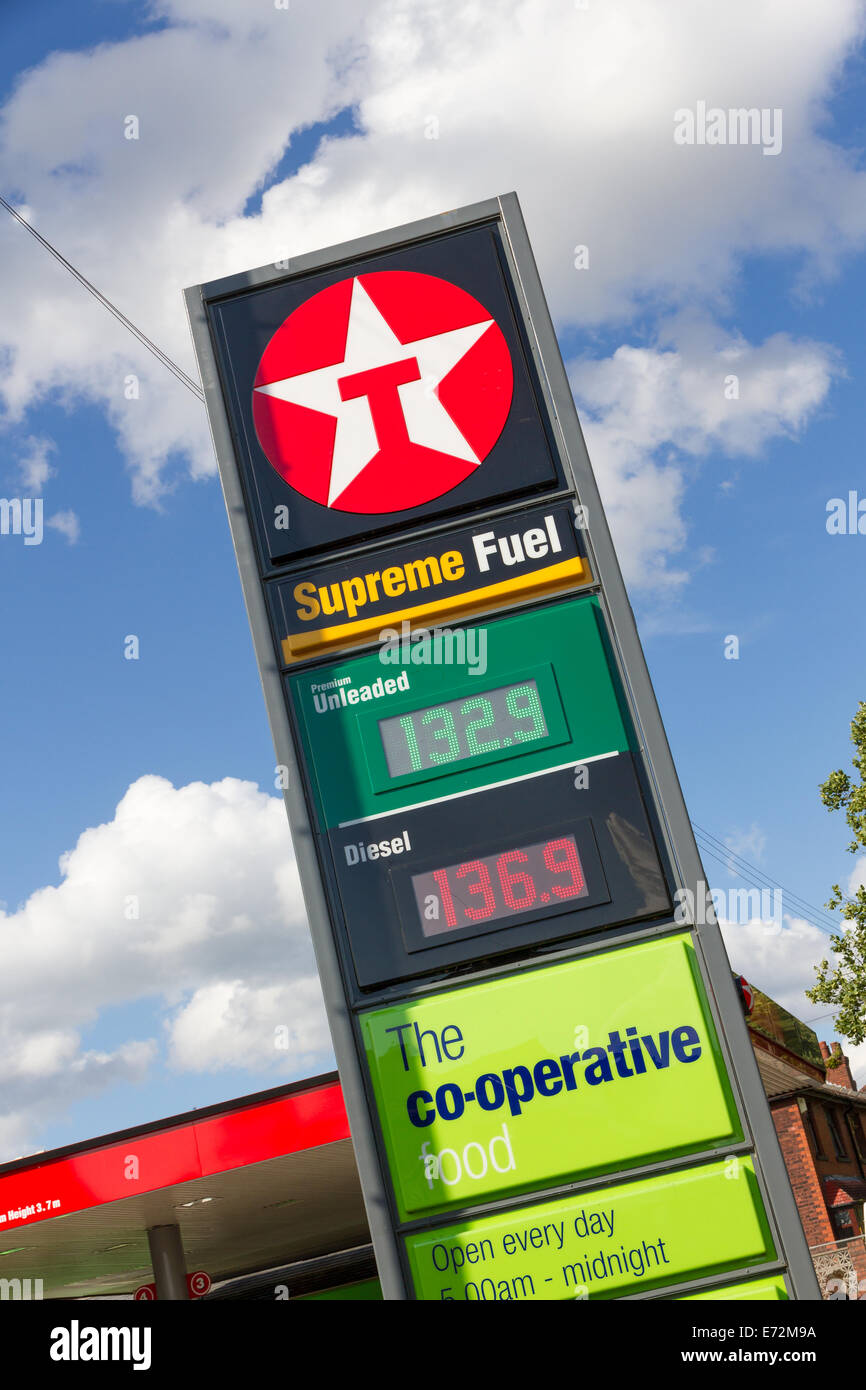 Petrol station forecourt sign with fuel and diesel prices Texaco Stock Photo