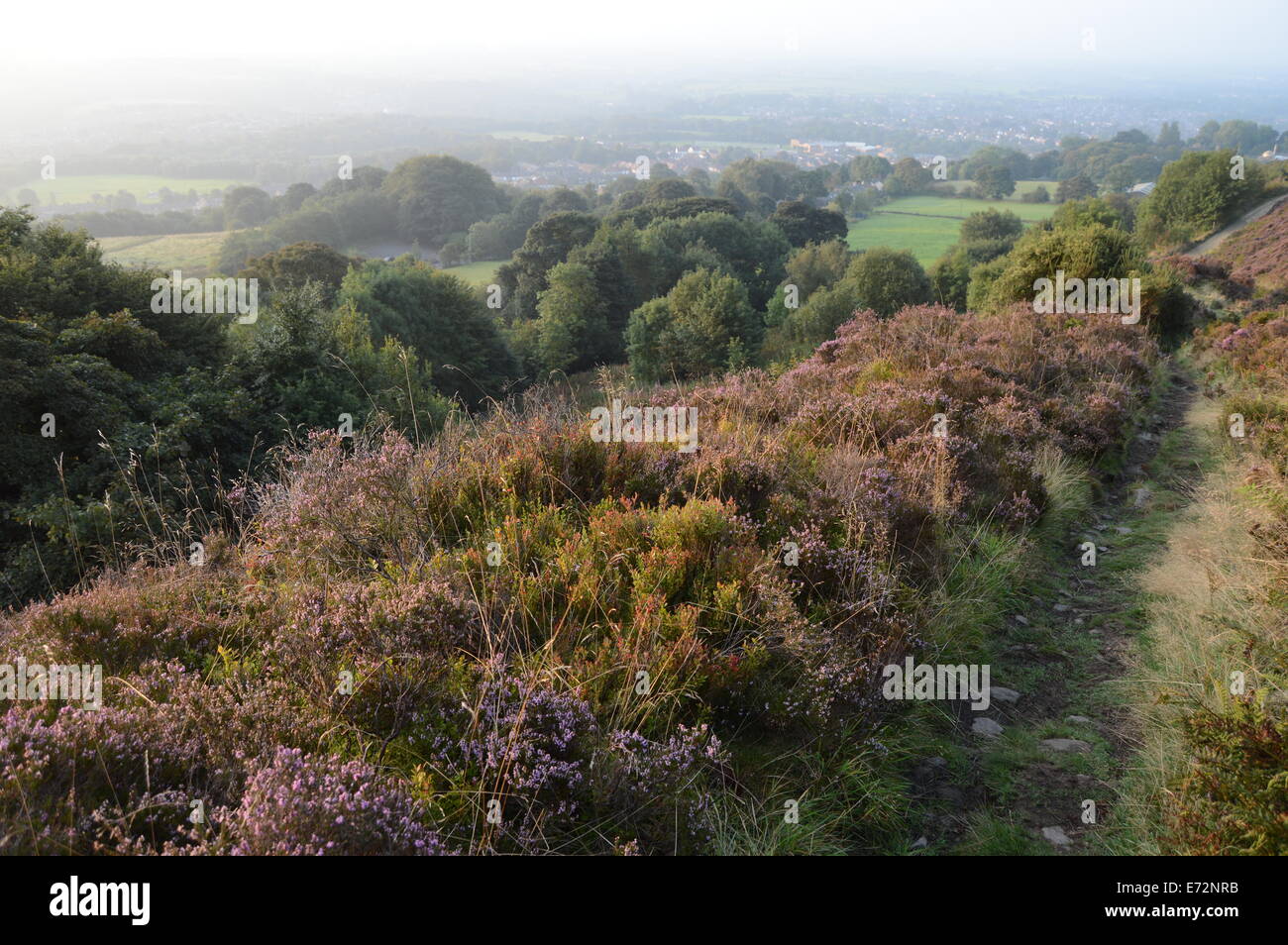 landscape view of Ramsbottom taken in the early morning sun from halfway up holcombe hill Stock Photo