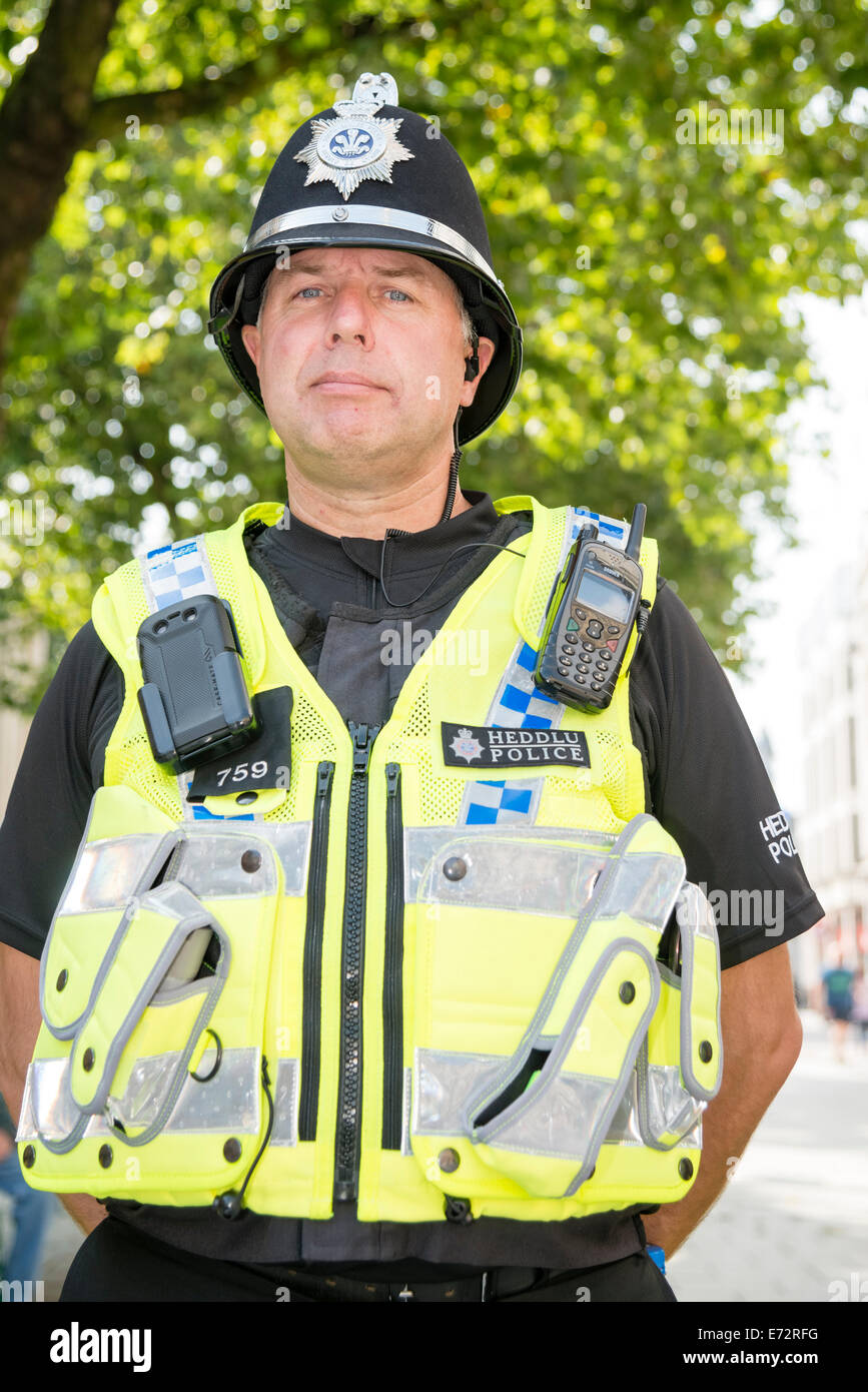 Male police officer in Cardiff, Wales, UK. Heddlu Welsh police. Stock Photo