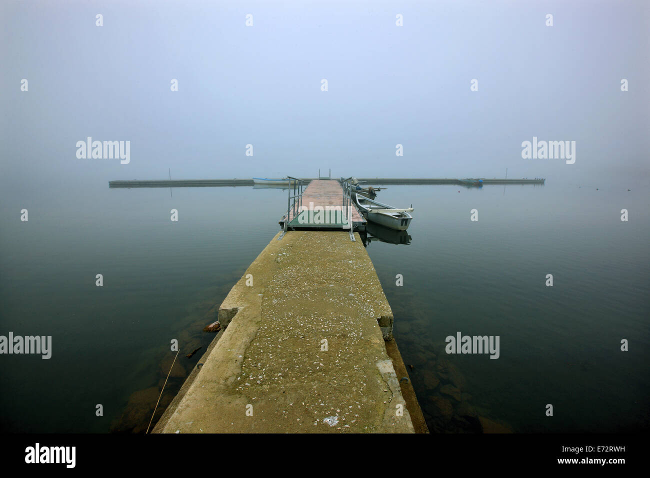 The small fishing port of Mikrolimni village, Mikri ('small') Prespa lake, Florina, Macedonia, Greece. Stock Photo