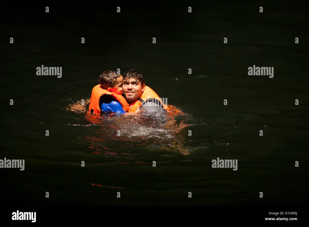 People wearing life jackets hi-res stock photography and images - Alamy