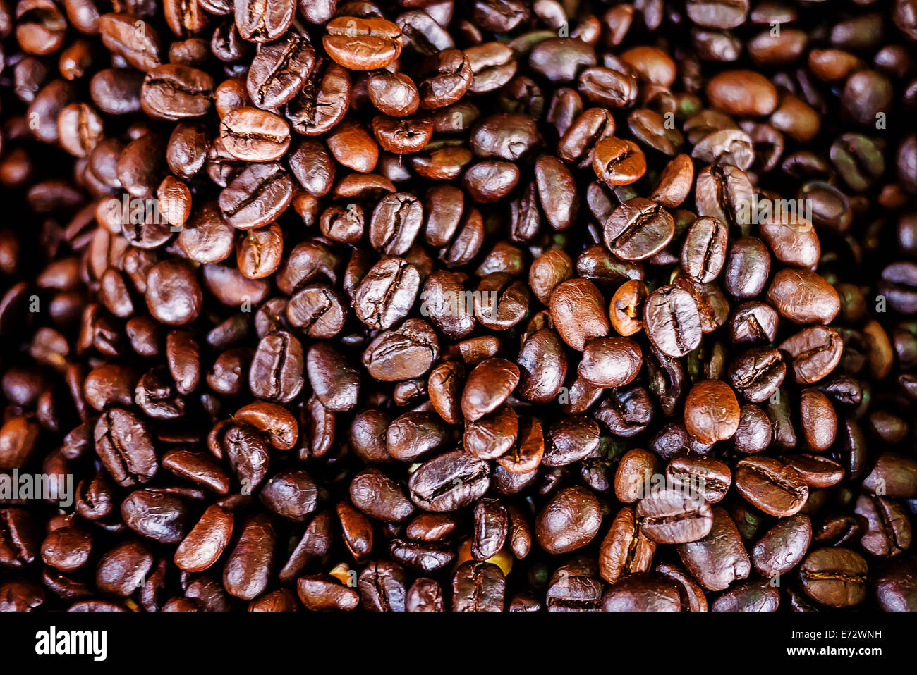roasted coffee beans for background Stock Photo - Alamy