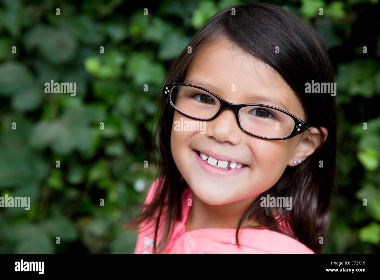 Portrait of smiling girl (6-7) Stock Photo