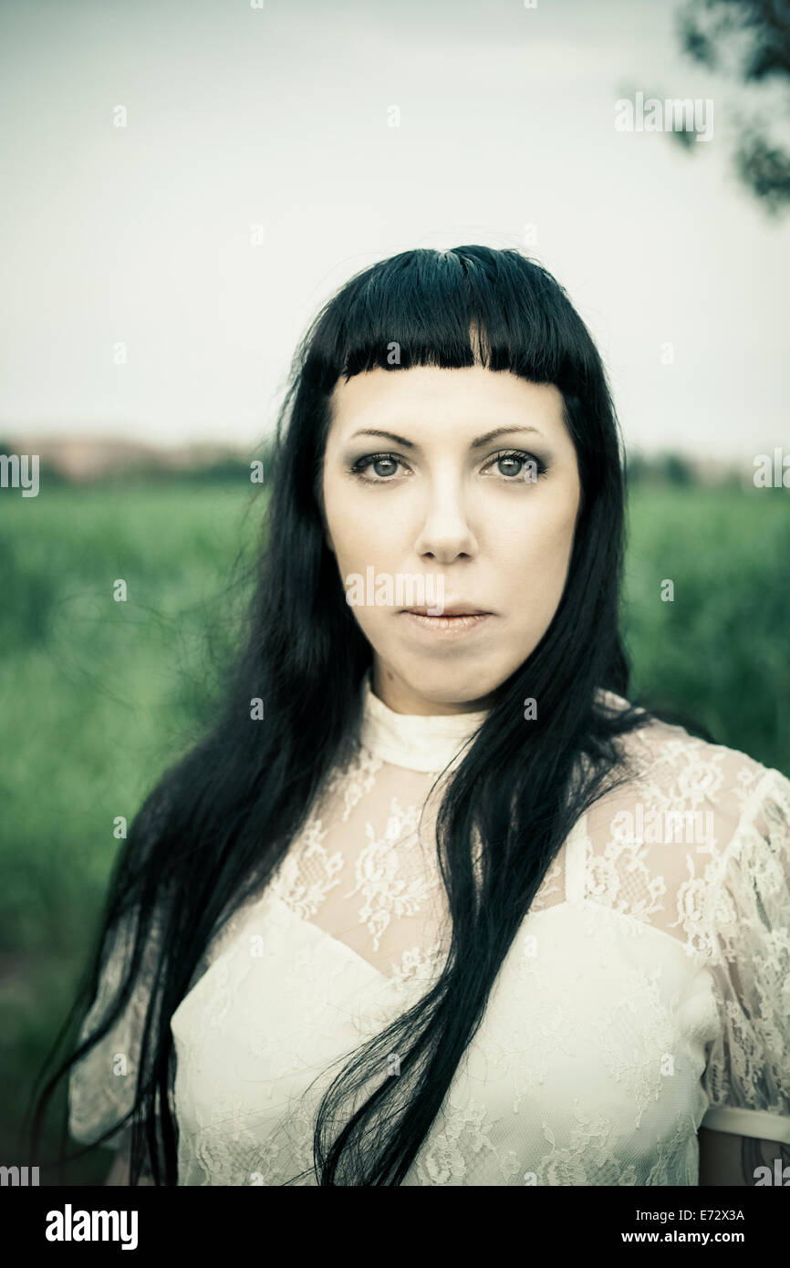 Portrait of woman with black hair Stock Photo