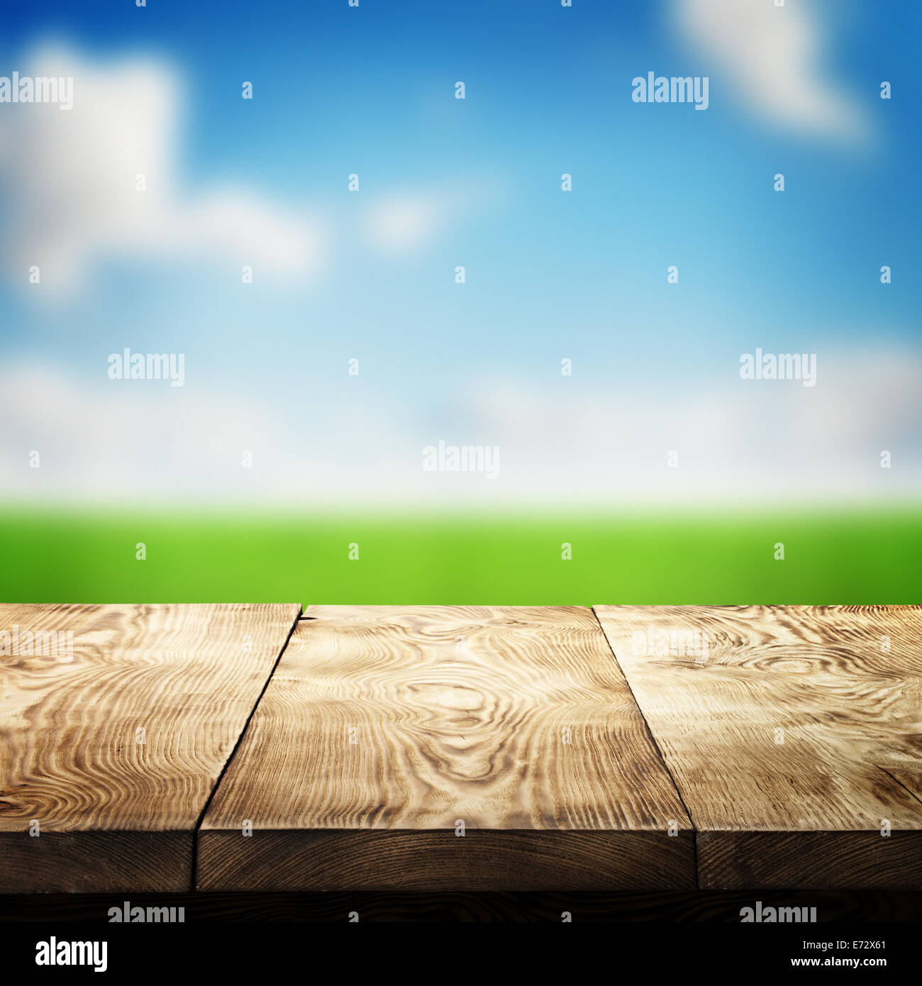 Empty wooden table over bokeh natural background Stock Photo