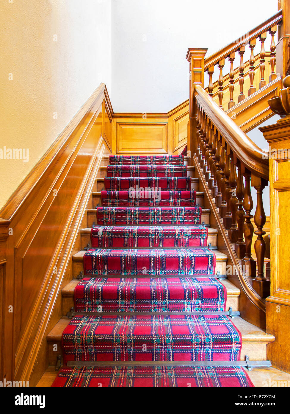 Stairs with carpet strip, old wooden staircase Stock Photo Alamy