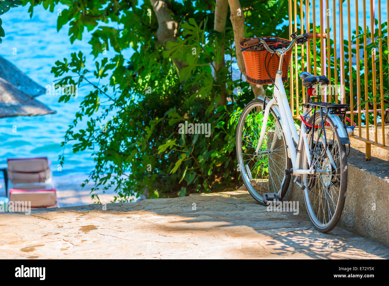 white bicycle parked near the sea Stock Photo