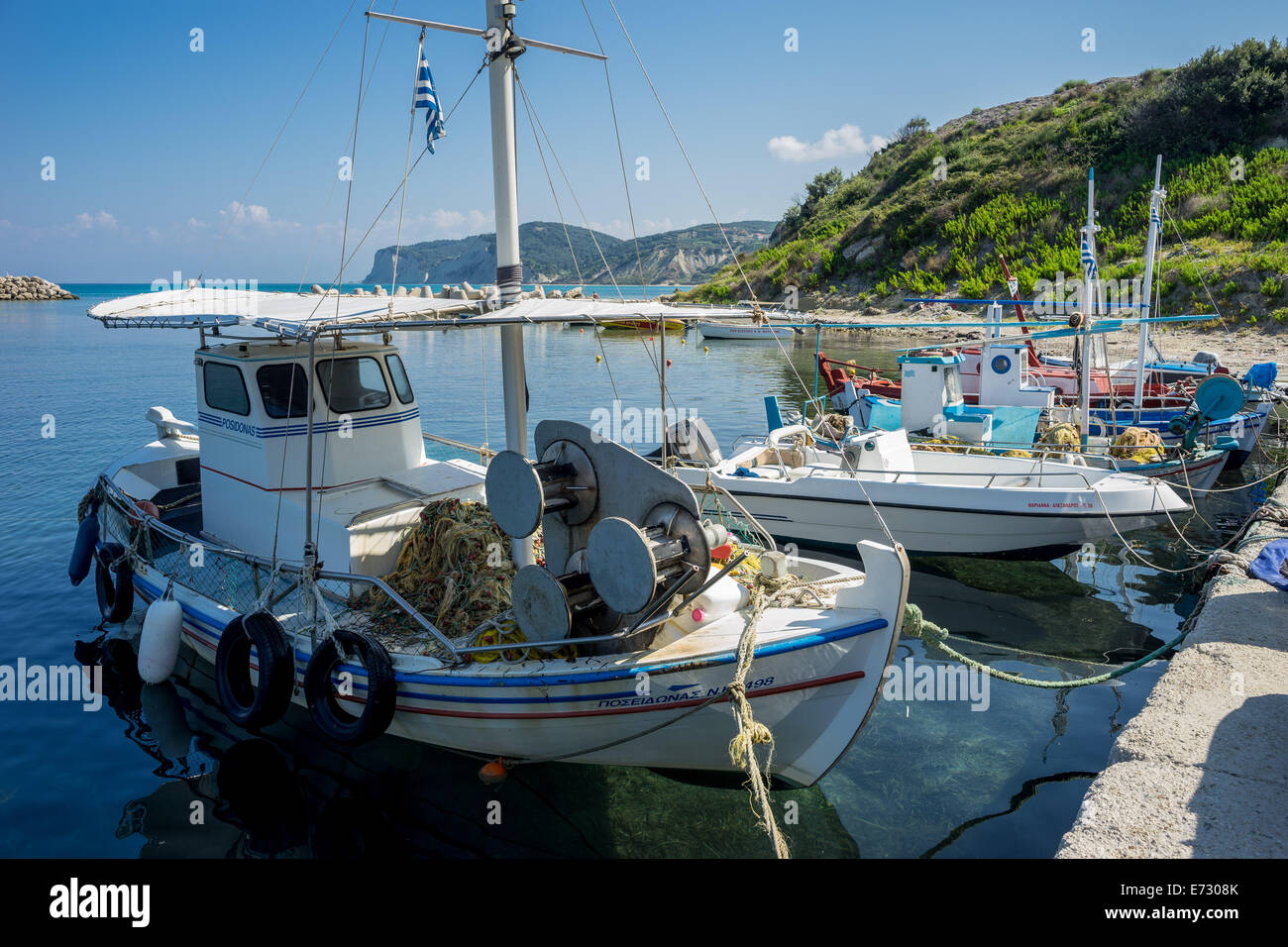 Old colorful wooden greek fishing boat Agios Stefanos Corfu Stock Photo