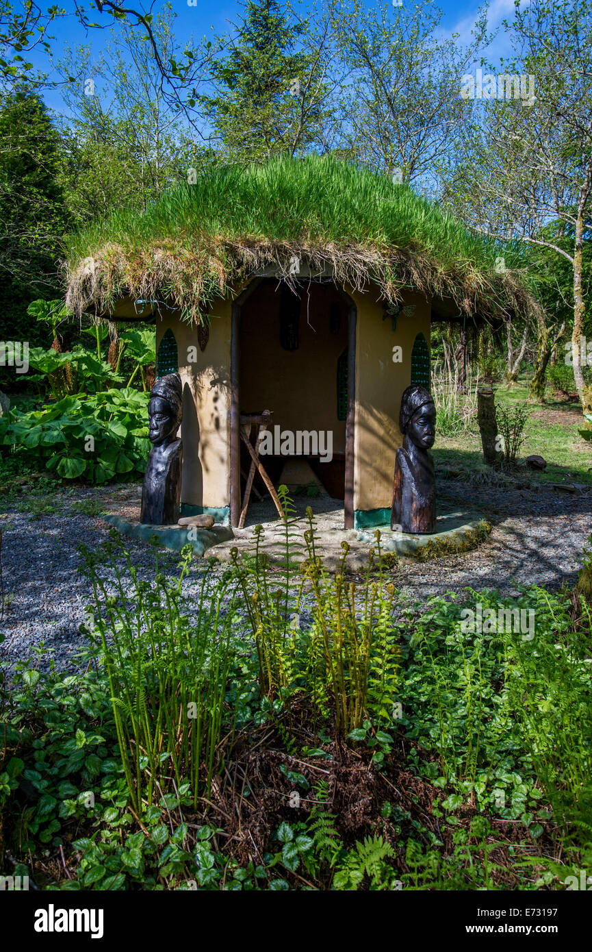 African style hut with living grass roof, Bwlch-y-Geufford,Wales Stock Photo