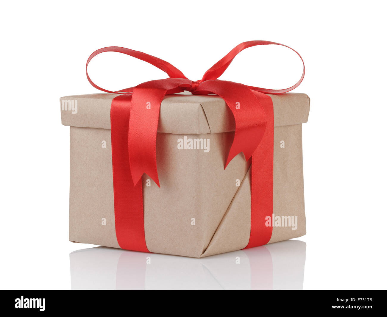 one gift christmas box wrapped with kraft paper and red bow, isolated ...