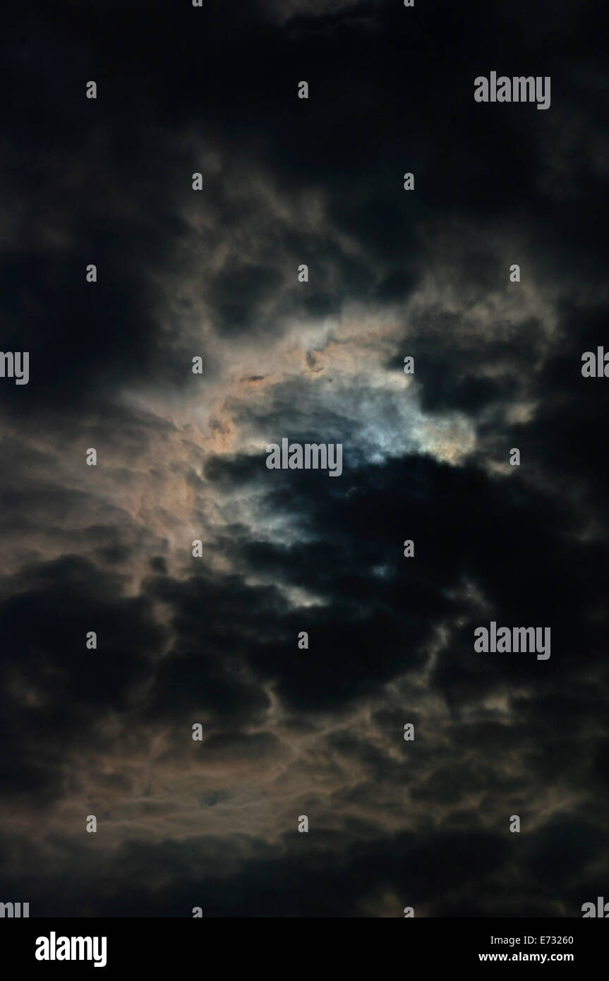 The Sun Breaking Through Clouds Stock Photo - Alamy