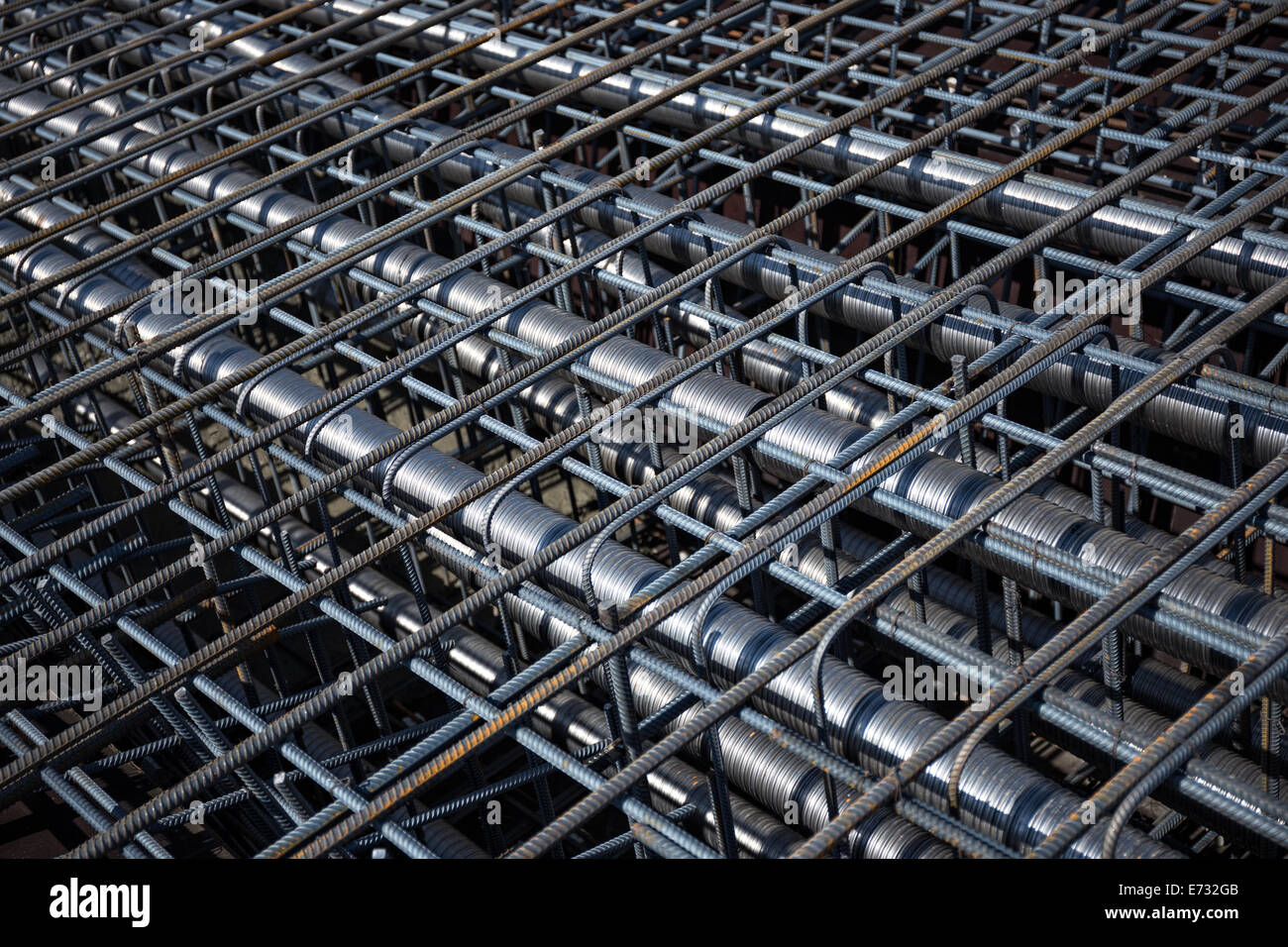 Ferro-concrete reinforcement with tensioned cables in the superstructure of the bridge. Stock Photo