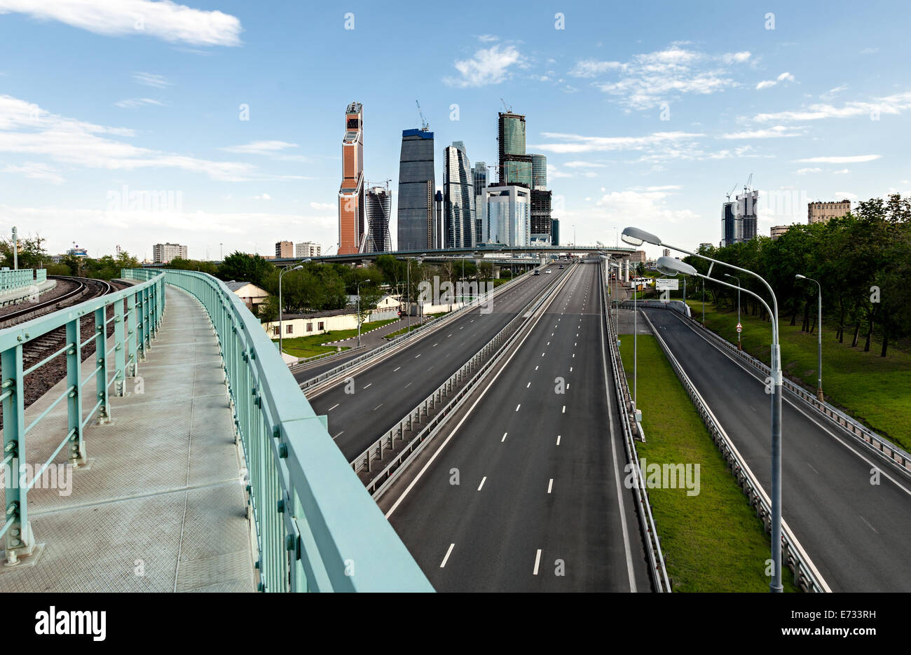 View of the highway and the city from the bridge Stock Photo