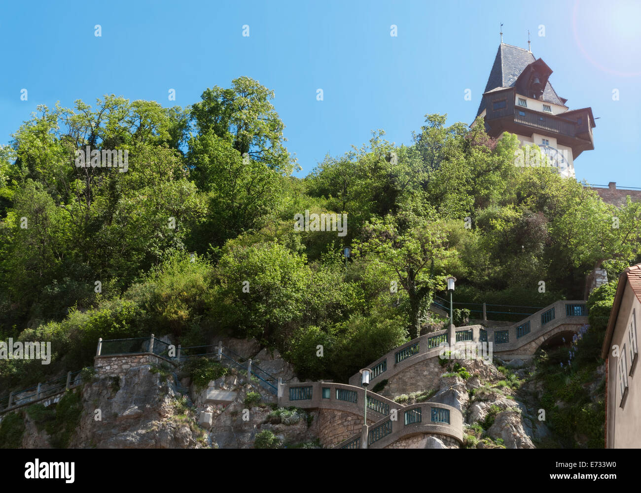 The clock tower on Schlossberg in the austian city of Graz Stock Photo ...