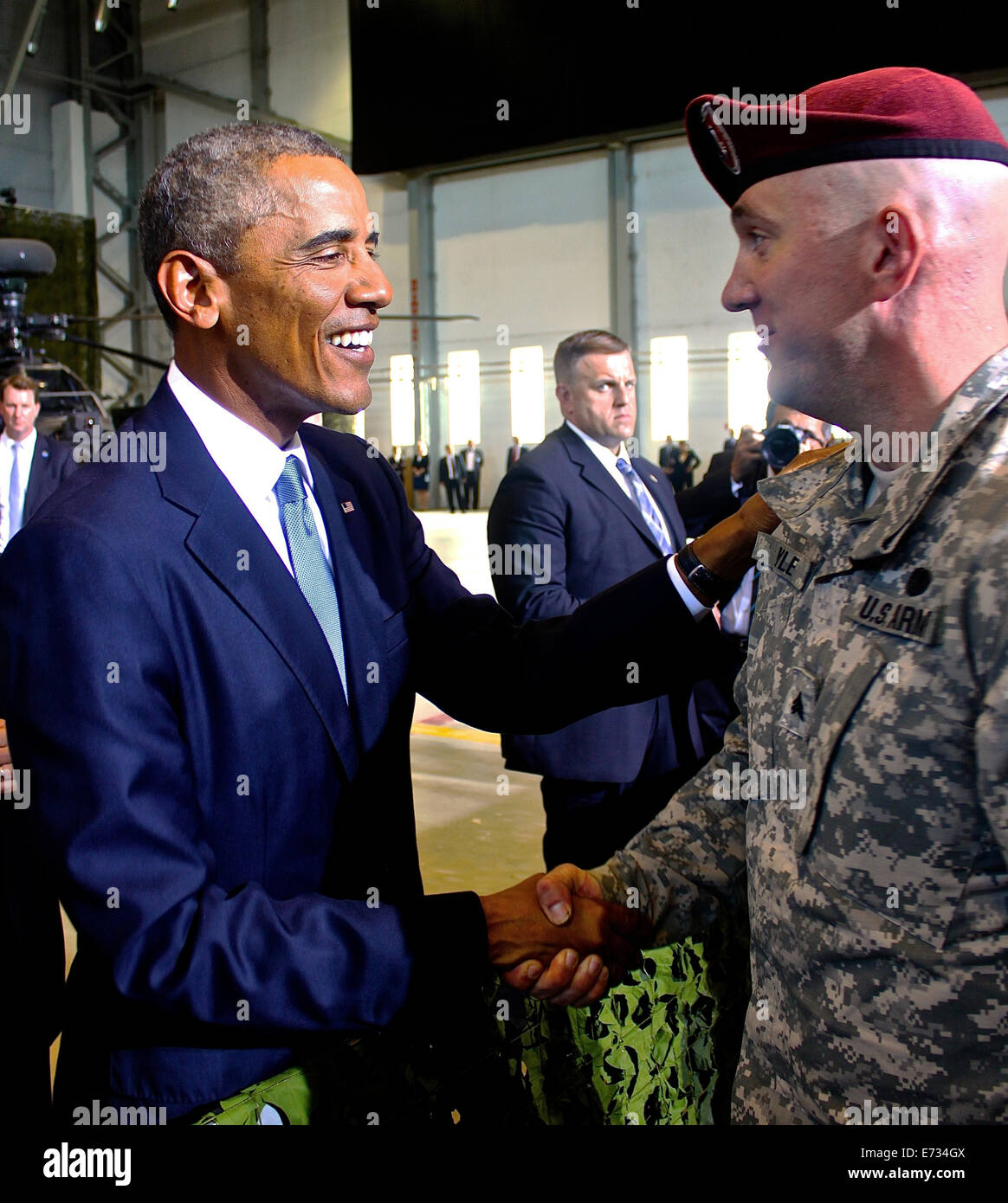 US President Barack Obama greets paratroopers from the U.S. Army 173rd Airborne Brigade during a visit September 3, 2014 in Tallinn, Estonia. The 173rd Airborne Brigade is currently conducting combined training missions in Poland, Estonia, Latvia and Lithuania in support of NATO. Stock Photo