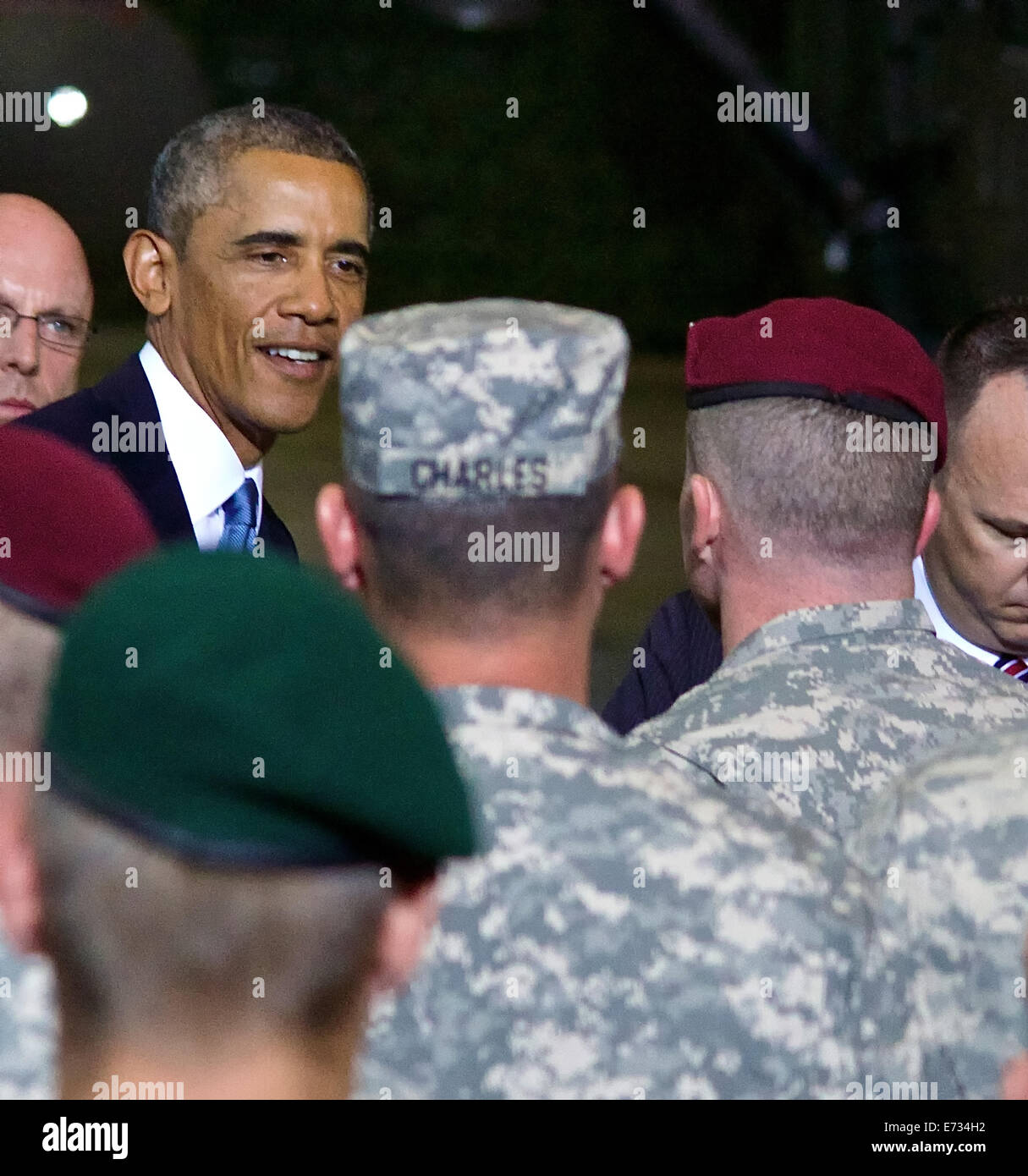 US President Barack Obama greets paratroopers from the U.S. Army 173rd Airborne Brigade and Estonian soldiers from the Estonian Single Scouts Battalion during a visit September 3, 2014 in Tallinn, Estonia. The 173rd Airborne Brigade is currently conducting combined training missions in Poland, Estonia, Latvia and Lithuania in support of NATO. Stock Photo