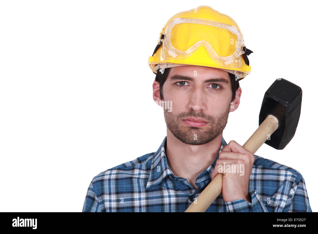 Attractive construction worker with a sledgehammer Stock Photo Alamy