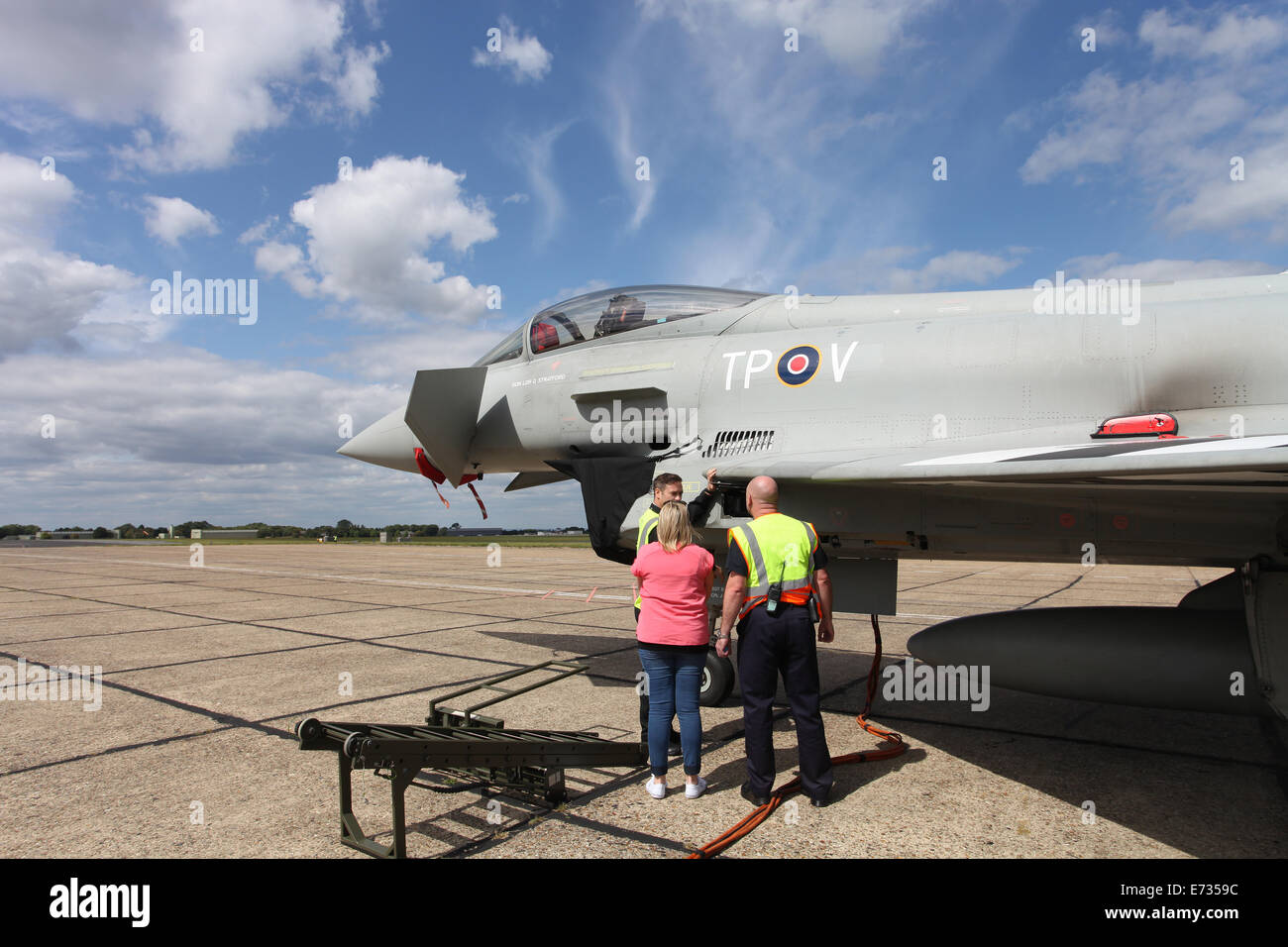 Visitors looking at a Eurofighter parked on the tarmac at Bigging Hill airport Stock Photo