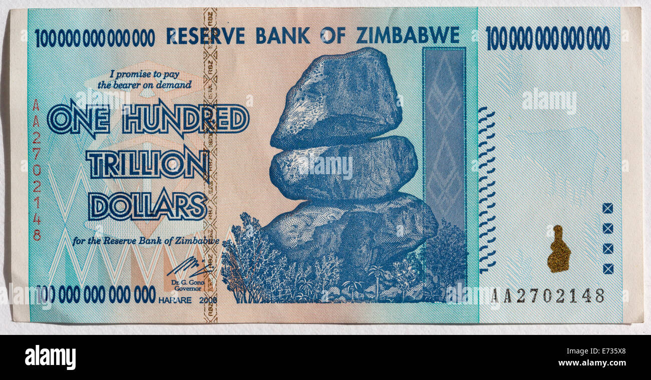 A Zimbabwean one hundred trillion dollar note as was in circulation in 2008 during the period of hyper-inflation in Zimbabwe Stock Photo