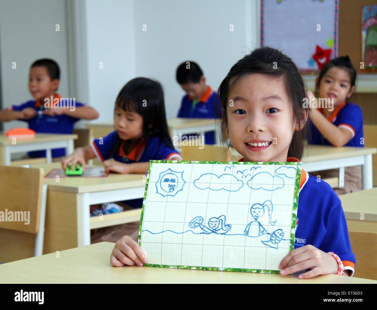 Ho Chi Minh, Vietnam. 5th Sep, 2014. Students of Wellspring Saigon International Bilingual school study in class on the first day of the new semester in Ho Chi Minh City, Vietnam, Sept. 5, 2014. Credit:  Nguyen Le Huyen/Xinhua/Alamy Live News Stock Photo