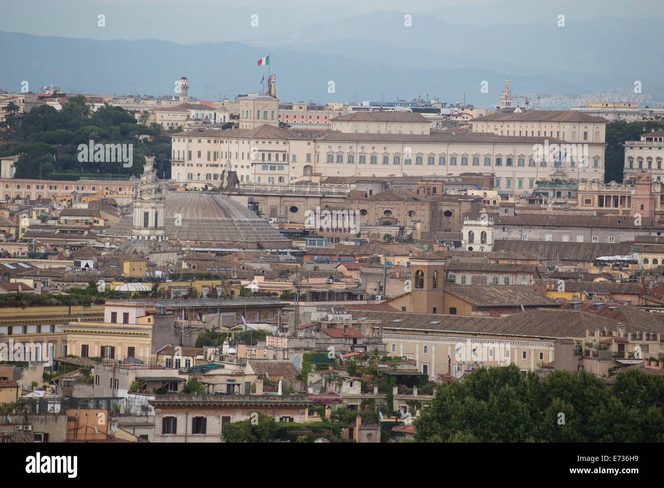 Rome's cityscape sant'Ivo alla Sapienza on the left in front of pantheon dome and presidential palace Quirinale Stock Photo