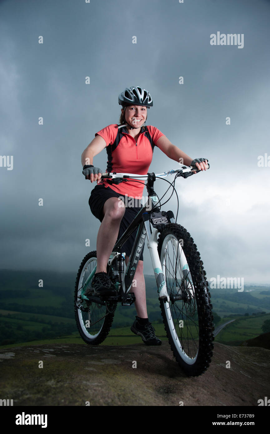 Female mountain biker in the Peak District, UK Stock Photo