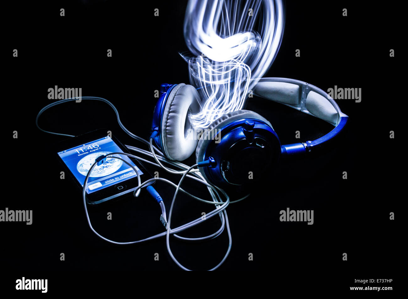 A light painting with headphones and an ipod Stock Photo - Alamy