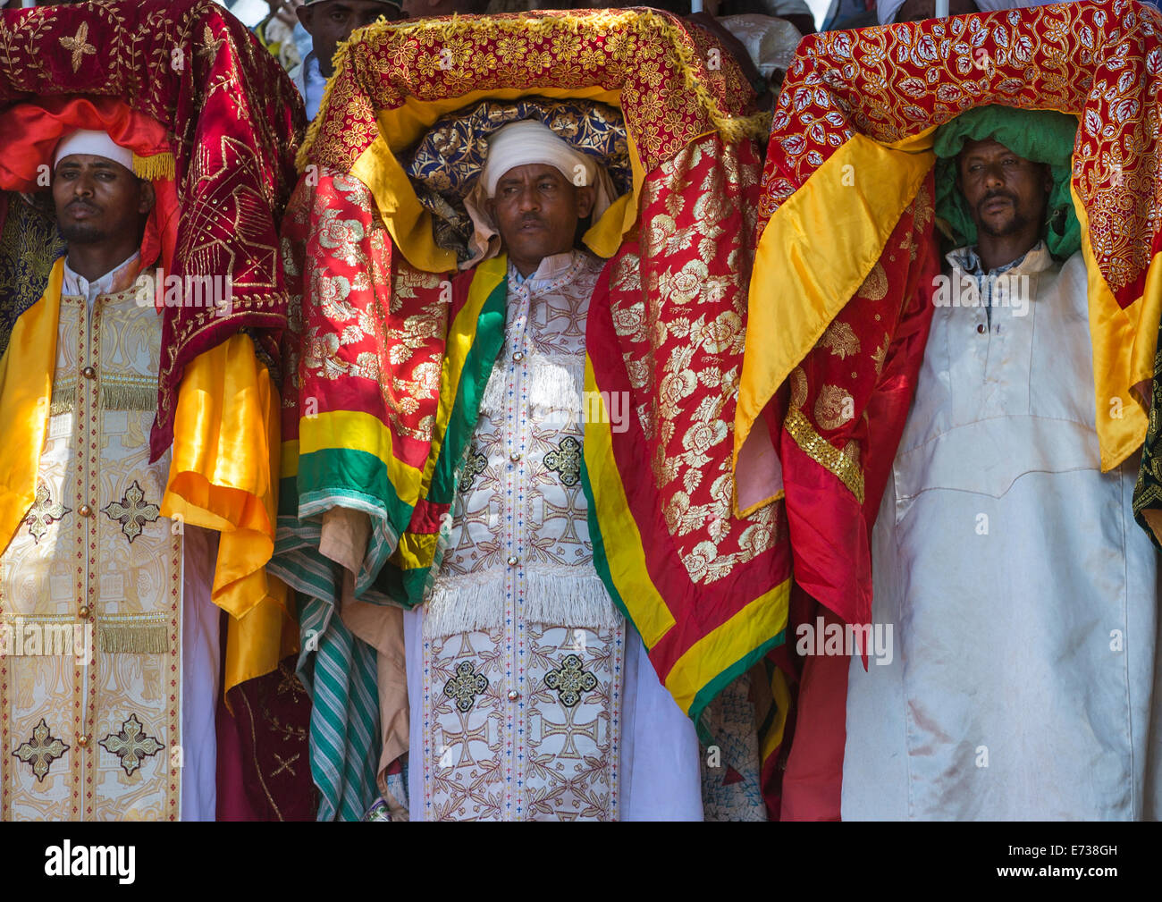 Priests Carrying Some Covered Tabots On Their Heads During Timkat Epiphany Festival, Lalibela, Ethiopia Stock Photo