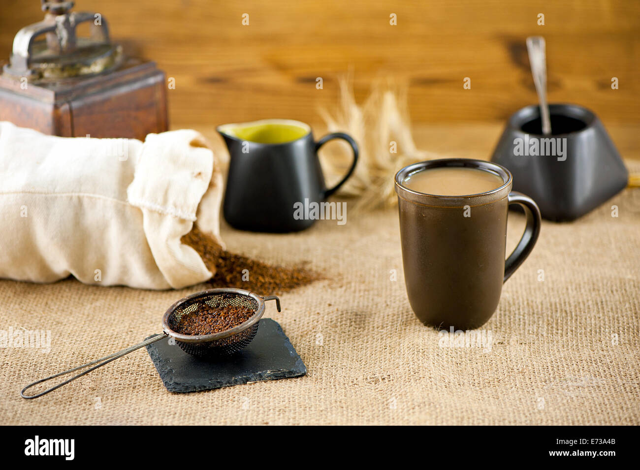 A mug of substitute coffee with milk and ears of rye at canvas Stock Photo Alamy
