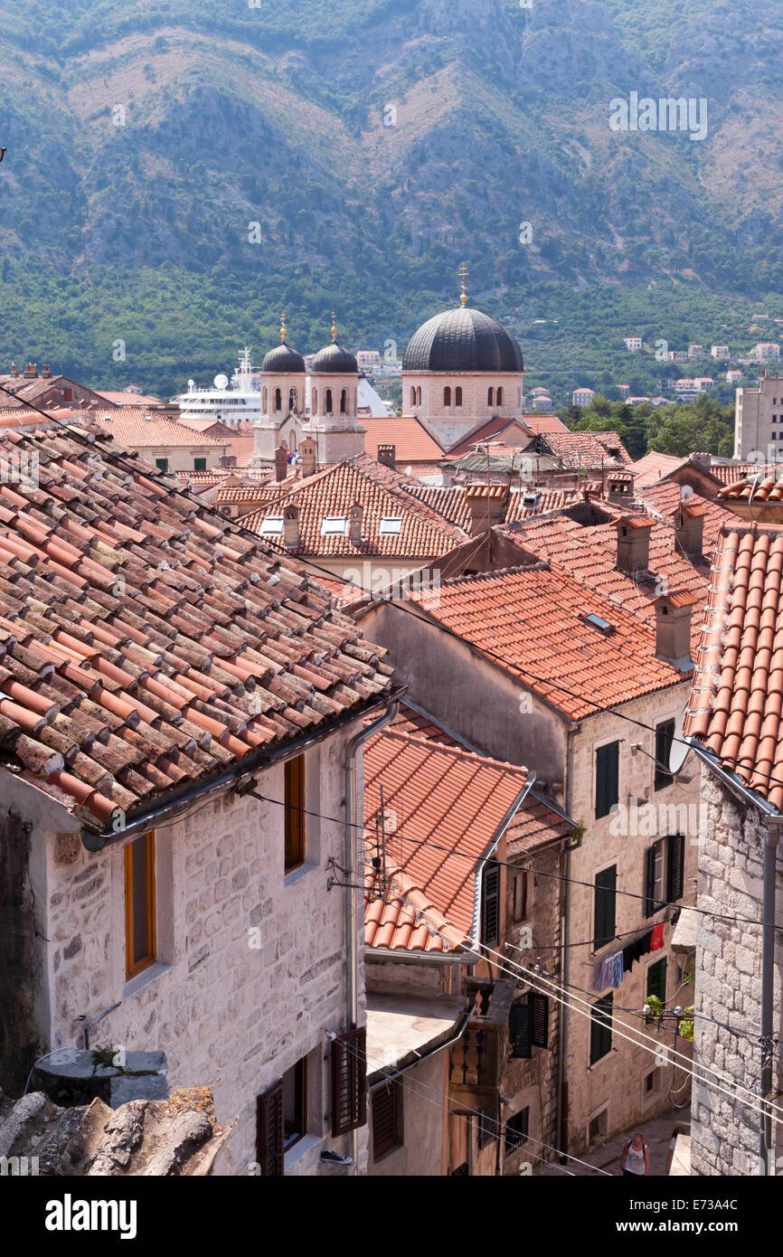 Elevated view of red roof tiles and the domes of the Church of St. Nicholas, Kotor, UNESCO Site, Montenegro Stock Photo