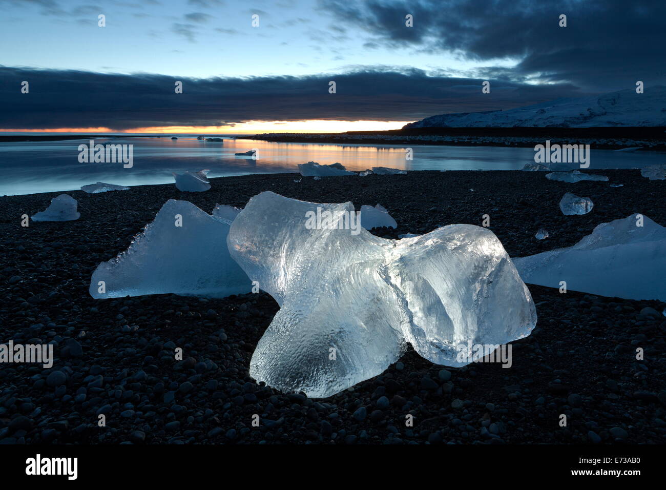 Icebergs at sunset on Jokulsa Beach, on the edge of the Vatnajokull National Park, South Iceland, Iceland, Polar Regions Stock Photo