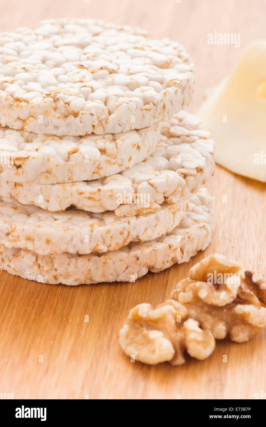 Stack of rice cakes and walnuts. Healthy lifestyle food. Stock Photo