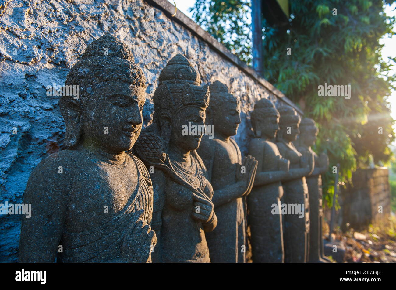 Late afternoon light on stone statues in the Pura Besakih temple complex, Bali, Indonesia, Southeast Asia, Asia Stock Photo