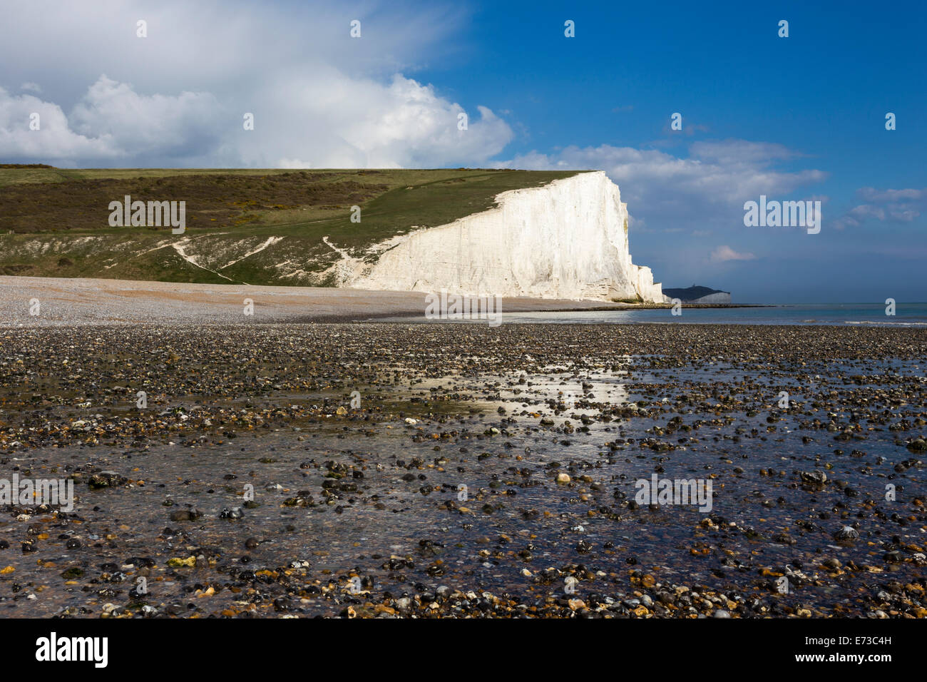 Pebble beach and the Seven Sisters Cliffs at Cuckmere Haven, Seaford, East Sussex, England, United Kingdom Stock Photo
