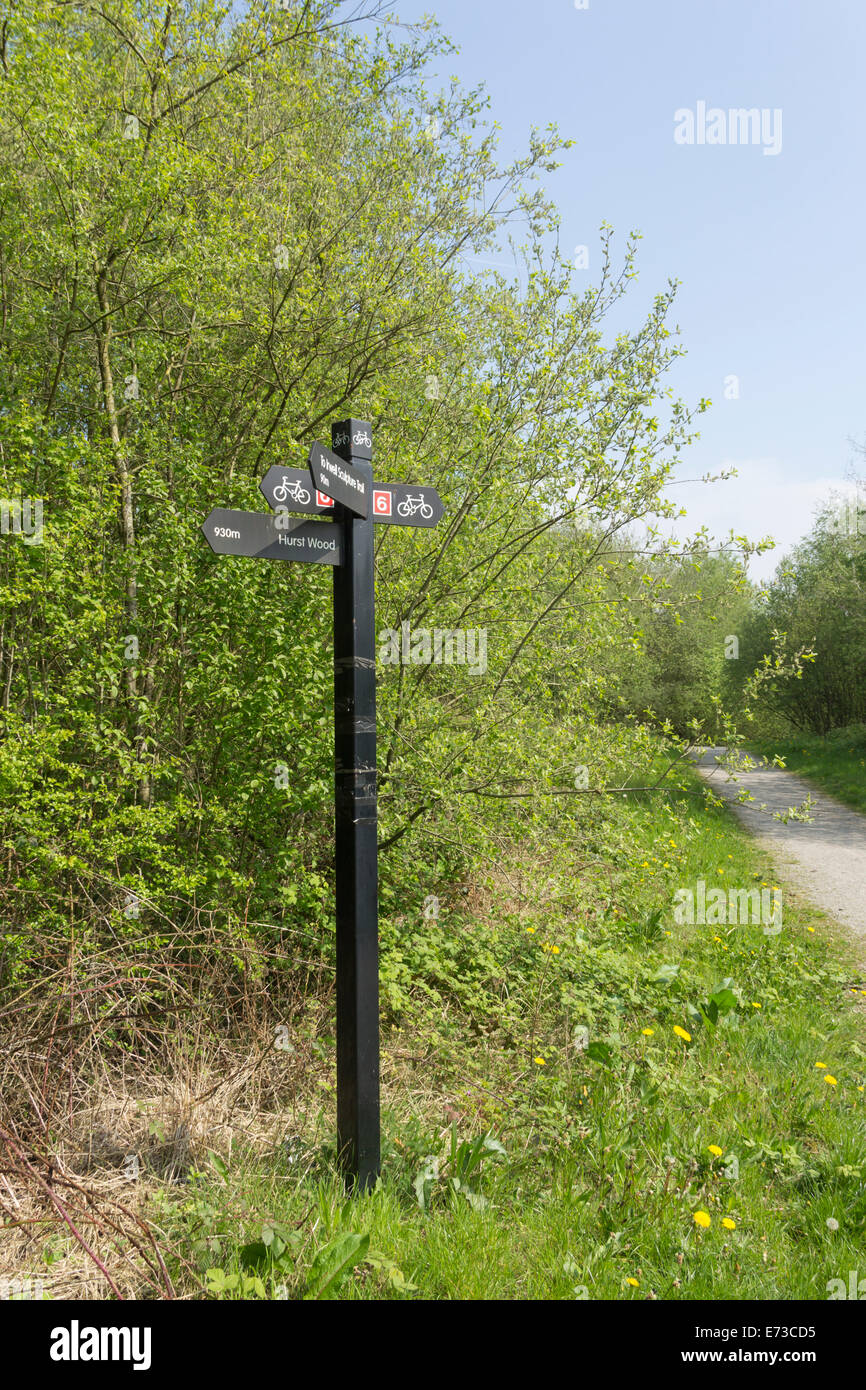 A direction sign for national cycle network  route 6 in Philips Park, a nature reserve in Prestwich, Manchester. Stock Photo