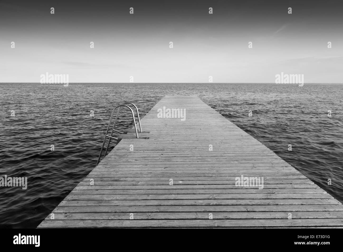 Wooden boardwalk into the sea, Fehmarn island, Schleswig-Holstein, Germany, Europe Stock Photo
