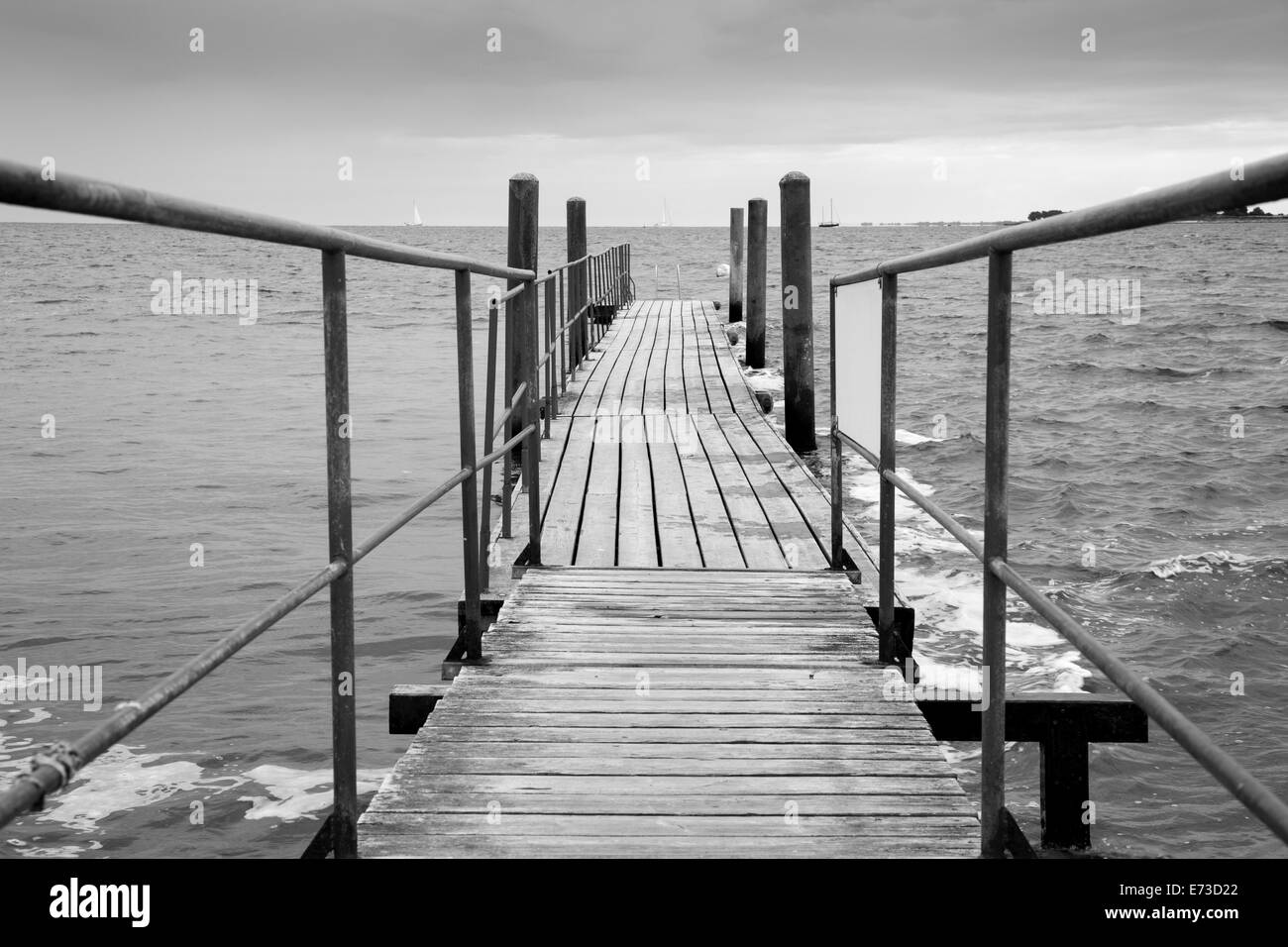 Wooden boardwalk into the sea, Fehmarn island, Schleswig-Holstein, Germany, Europe Stock Photo