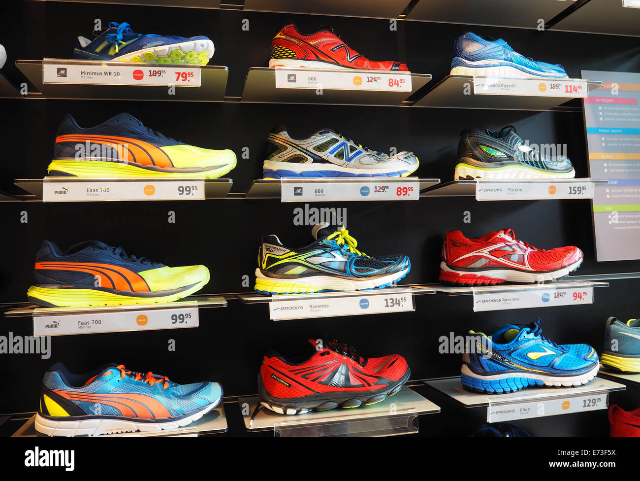 Sports shoes in a sports shop in Berlin on June 21, 2014. Photo: Wolfram Steinberg/dpa Stock Photo