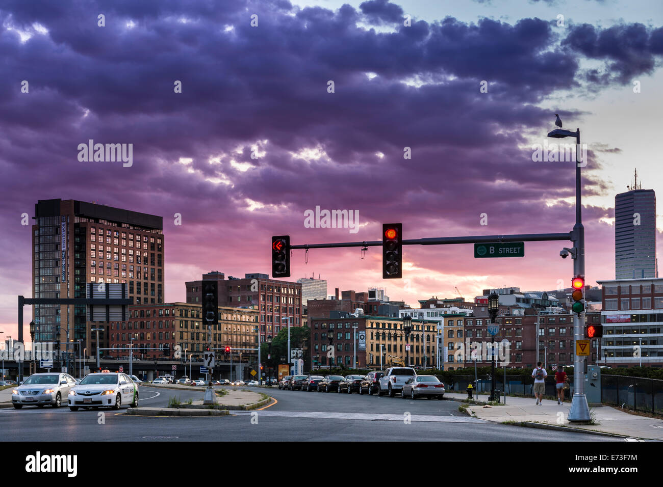 Red lights at a busy intersection in the Seaport district of Boston, Massachusetts - USA. Stock Photo