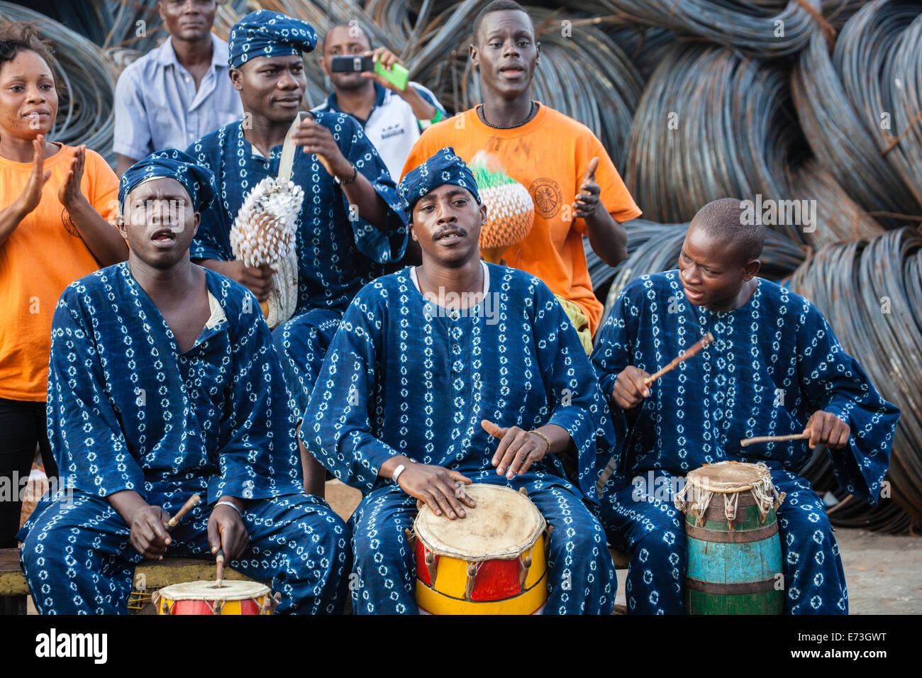 Africa, Benin, Cotonou. Band performing in traditional dress at port