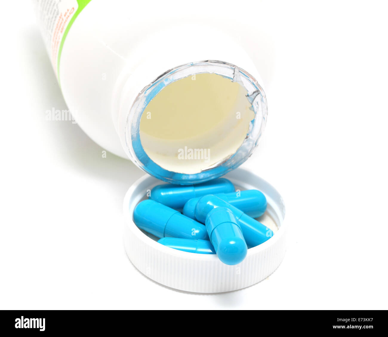 blue pills and packing on a white background Stock Photo