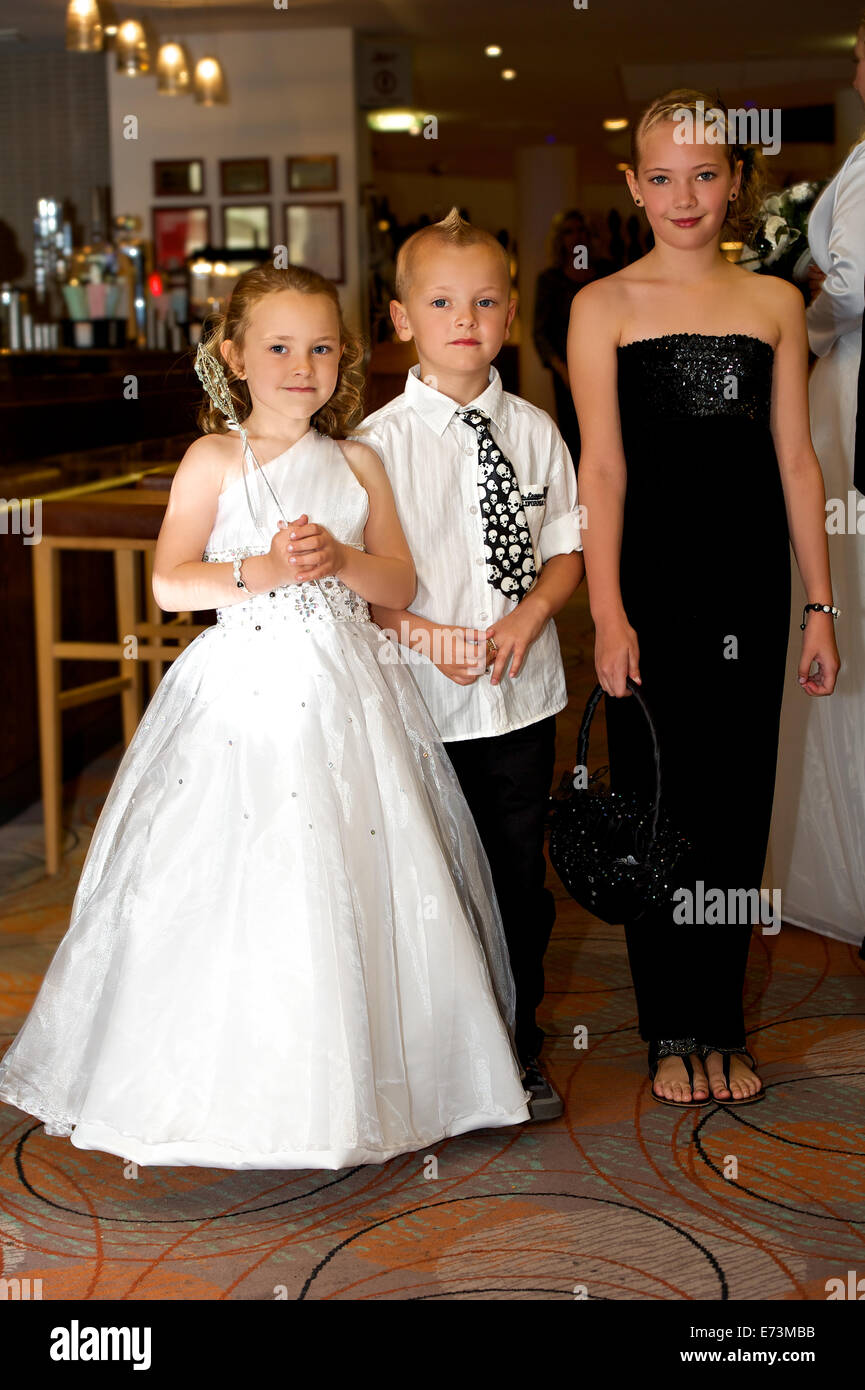 Two Bridesmaids and Page boy at wedding reception Stock Photo Alamy