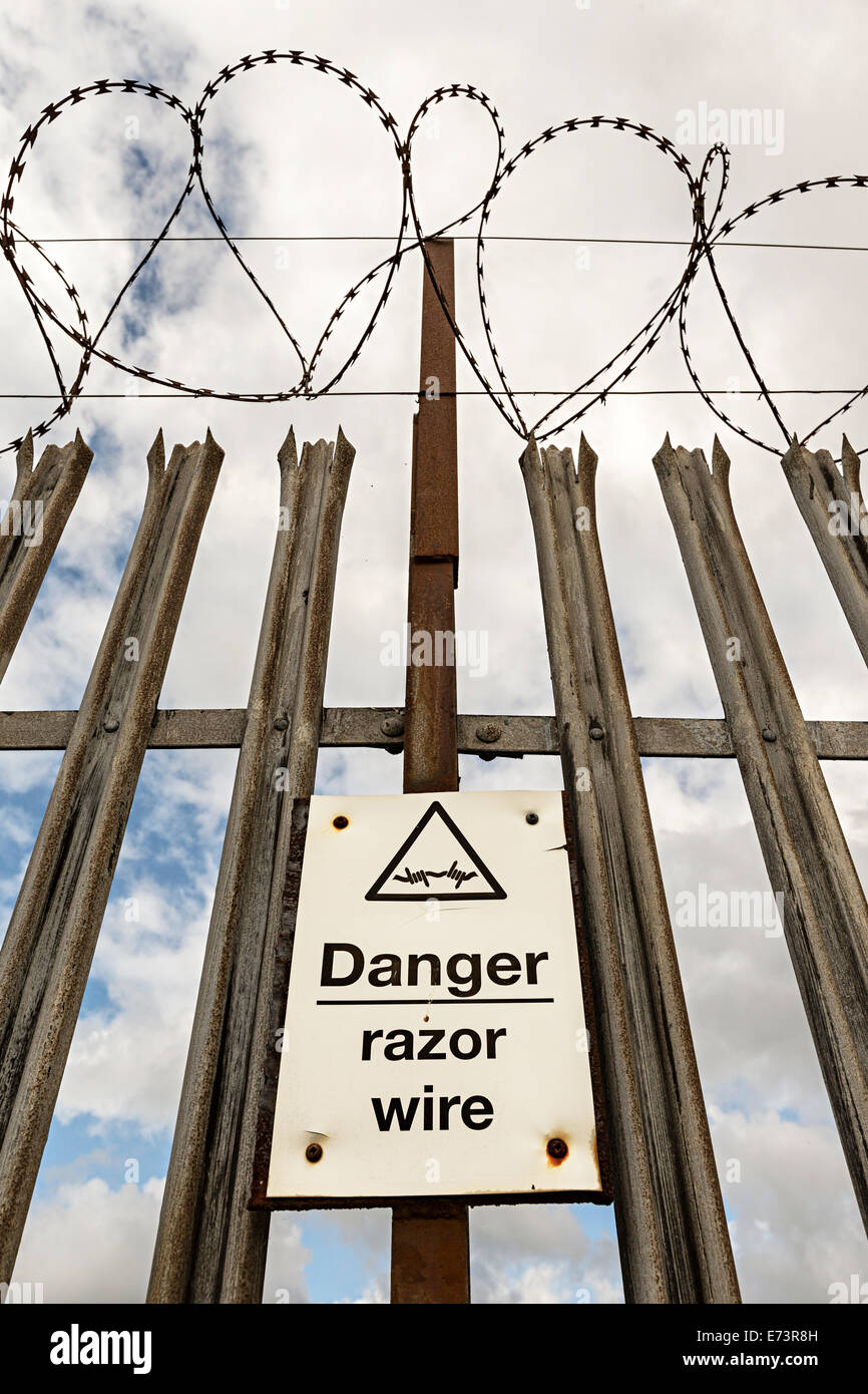 Danger, razor wire security fence, England, UK Stock Photo