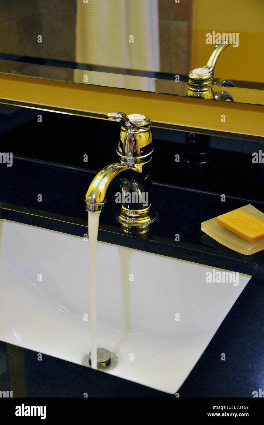 Faucet water running sink turned on hires stock photography and images