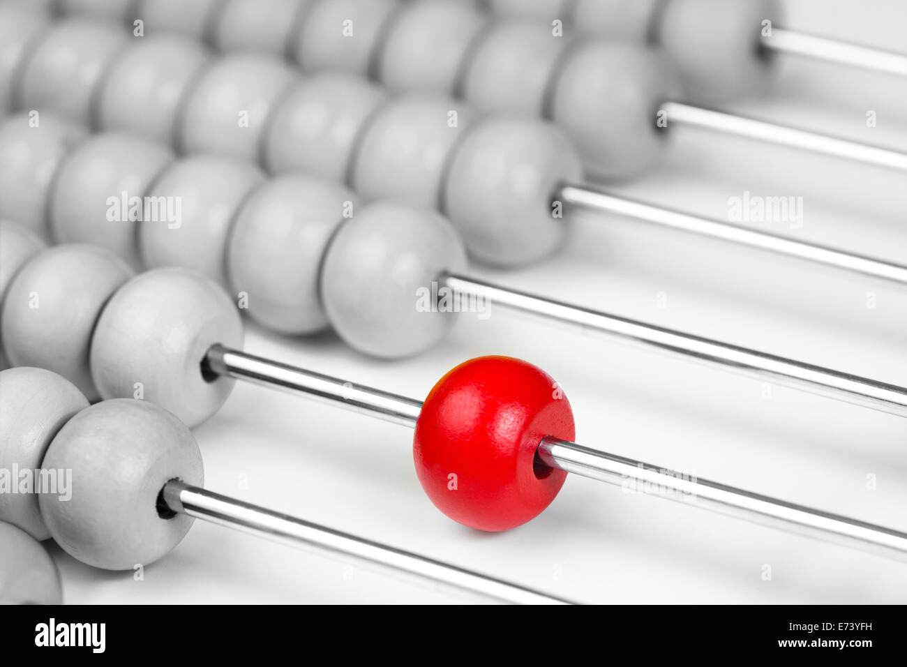 Abacus red bead closeup. Leadership concept. Stock Photo