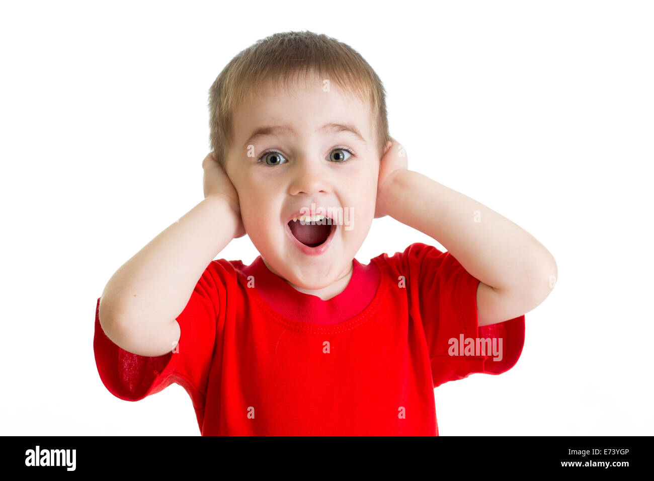 Surprised little boy portrait in red tshirt isolated Stock Photo