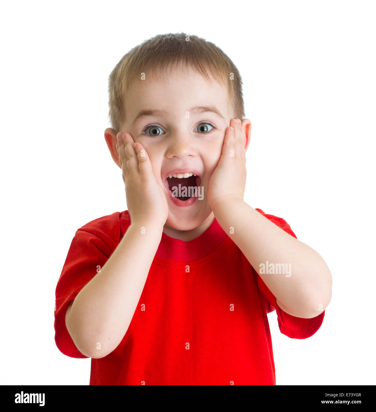 Surprised little boy portrait in red tshirt isolated Stock Photo