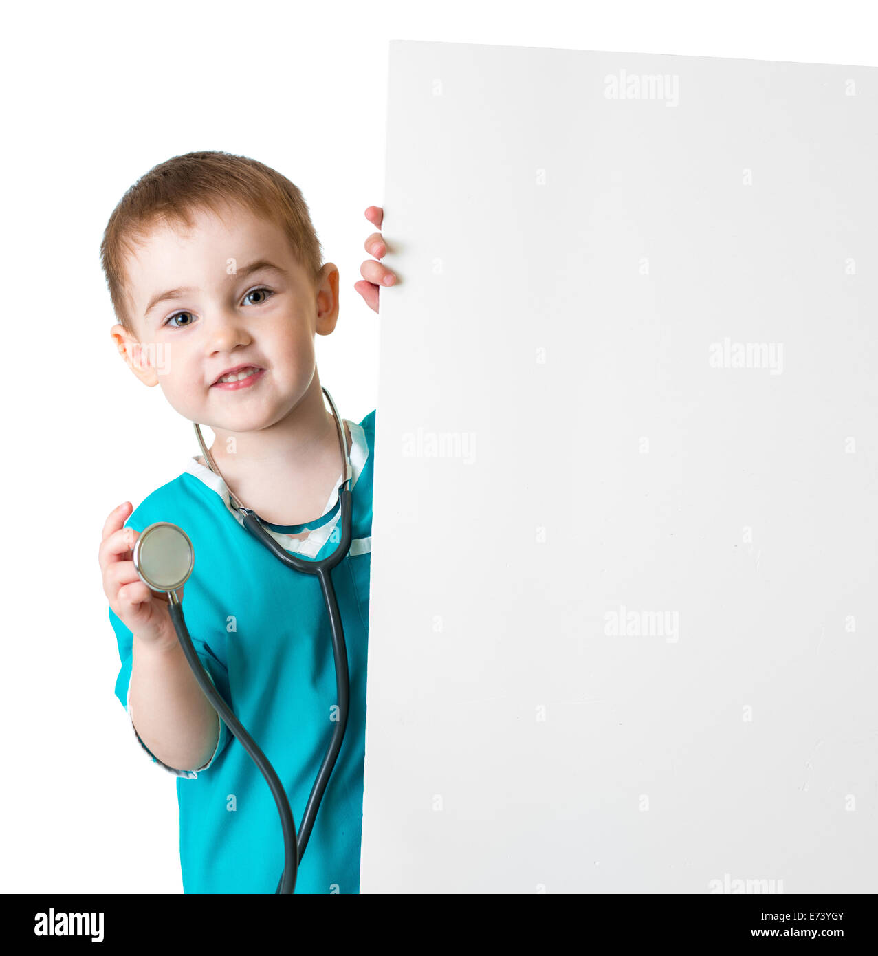 little doctor kid behind blank banner isolated Stock Photo