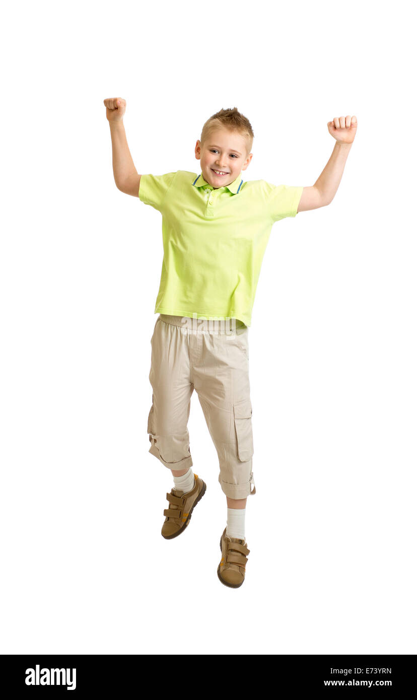 Handsome kid boy jumping or dancing on white background Stock Photo